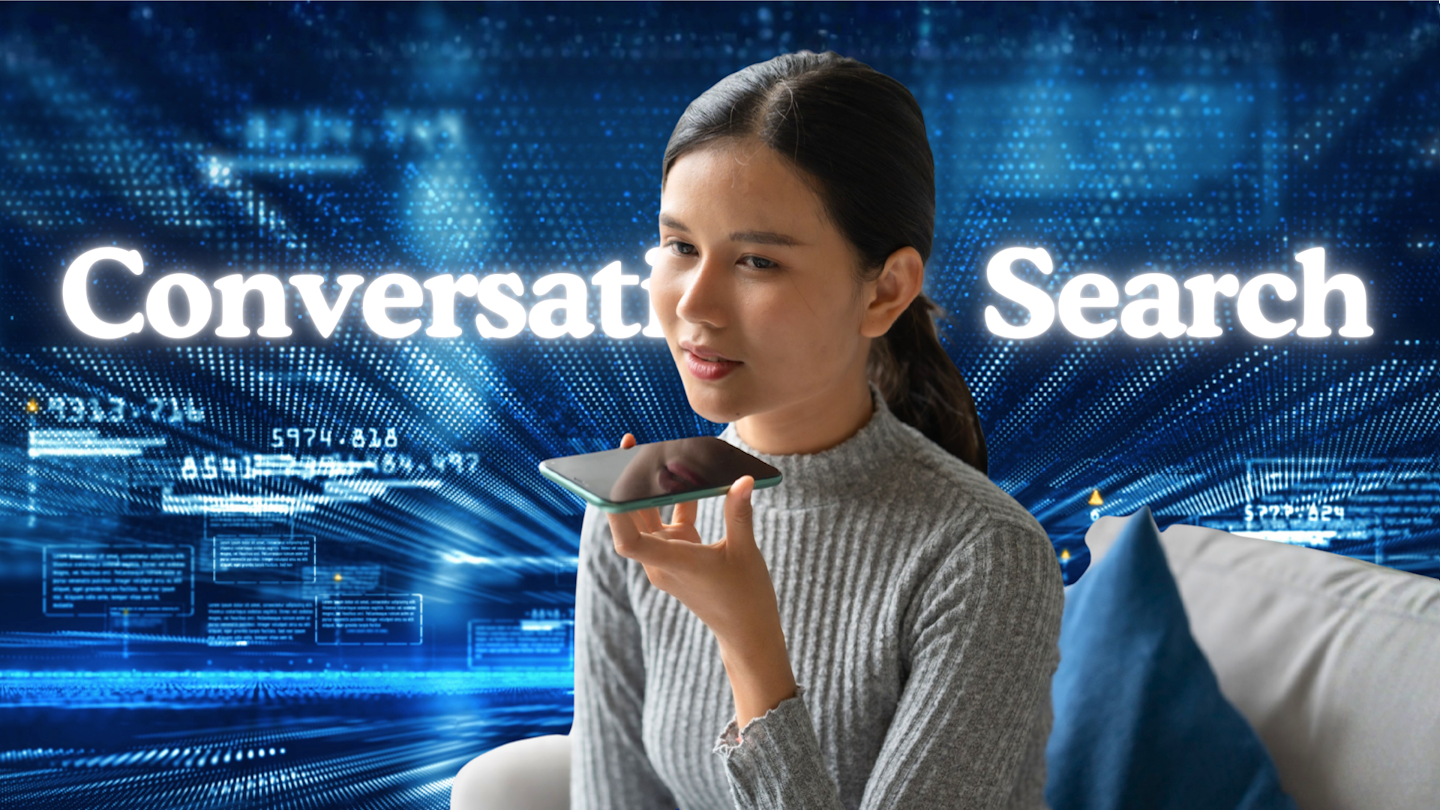 Woman speaking into cell phone with the words "Conversational Search" in the background